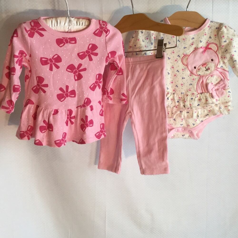 Baby girl outfit bundle in perfect pinks.